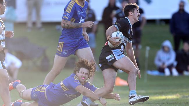 Terrigal’s Brock Laver with the ball against Toukley. Picture: Sue Graham