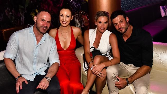 Bachelor contestants Blair Tom (second from right) and Charlie Newling (far right) enjoy a night with friends.