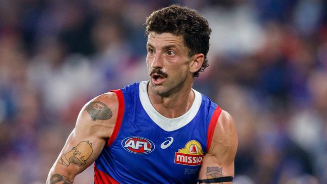 MELBOURNE, AUSTRALIA - MARCH 31: Tom Liberatore of the Bulldogs in action during the 2024 AFL Round 03 match between the Western Bulldogs and the West Coast Eagles at Marvel Stadium on March 31, 2024 in Melbourne, Australia. (Photo by Dylan Burns/AFL Photos via Getty Images)