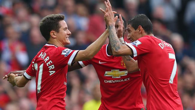 Ander Herrera of Manchester United (L) celebrates scoring the second goal.