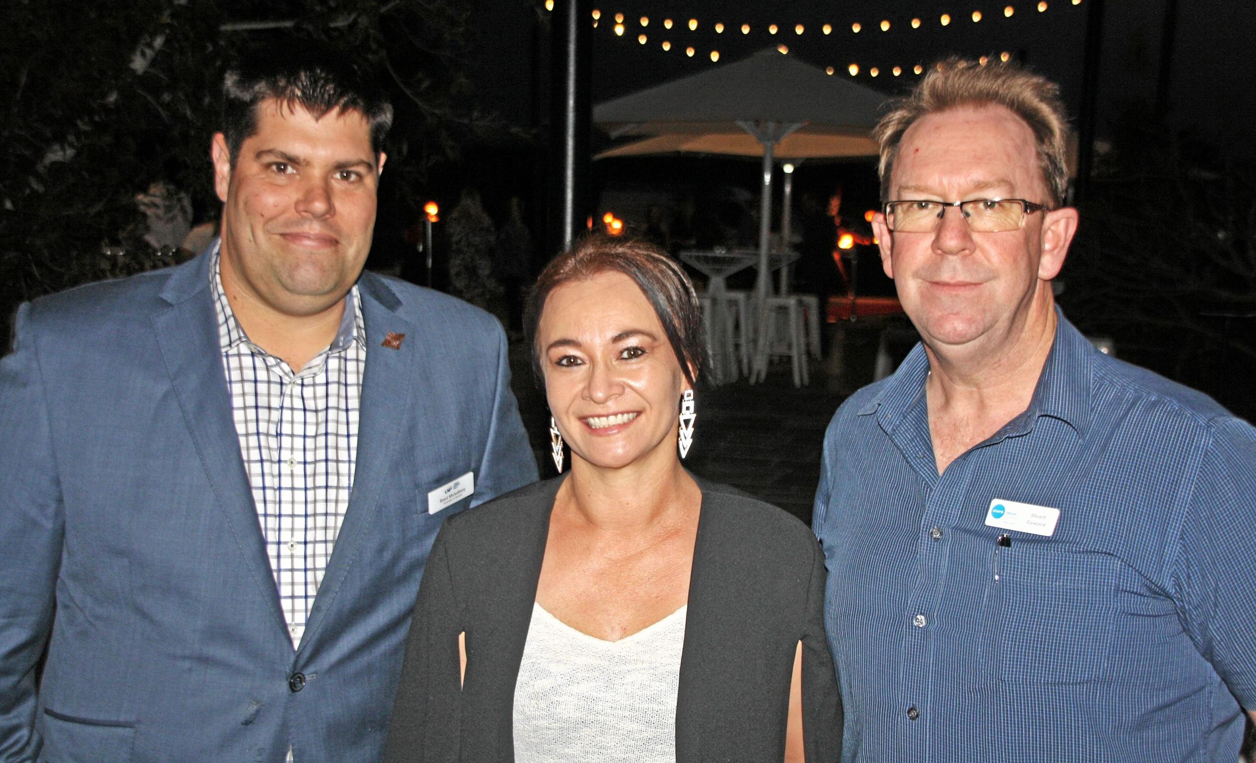 Brent Mickelberg with Angela Miles and Stuart Coward of STEPS at AVID Property Group's launch of its new sales and information centre in Palmview's master-planned community of Harmony. Picture: Erle Levey