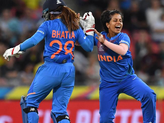 *ALTERNATIVE CROP* Poonam Yadav of India celebrates with wicketkeeper Taniya Bhatia after bowling Ellyse Perry of Australia for a duck during the WT20 World Cup cricket match between Australia and India at Sydney Showground Stadium in Sydney, Friday, February 21, 2020. (AAP Image/Dean Lewins) NO ARCHIVING, EDITORIAL USE ONLY, IMAGES TO BE USED FOR NEWS REPORTING PURPOSES ONLY, NO COMMERCIAL USE WHATSOEVER, NO USE IN BOOKS WITHOUT PRIOR WRITTEN CONSENT FROM AAP