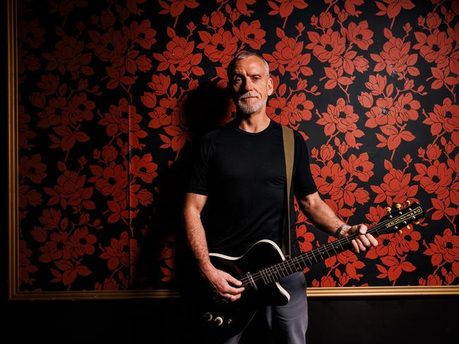 MELBOURNE, AUSTRALIA - The Australian.  August 29, 2024: Former SAS trooper and musician Harry Moffitt with his guitar to promote a gig in Perth on September 6 to mark the 60th anniversary of the SAS. His band the Externals has just released a new EP called Back On The Cans.Picture: The Australian / Nadir Kinani