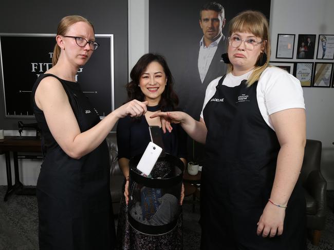 Business owner Clare Sheng has a policy where she and her 13 employees at The Fitting Room on Edward can only answer their phone in an emergency and only browse during lunch breaks. Picture: AAP/David Clark