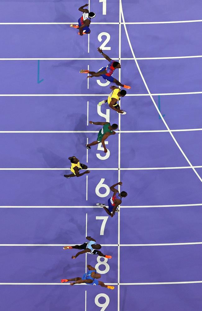 Noah Lyles of Team United States crosses the finish line to win gold during the Men's 100m Final by the smallest of margins. Picture: Richard Heathcote/Getty Images