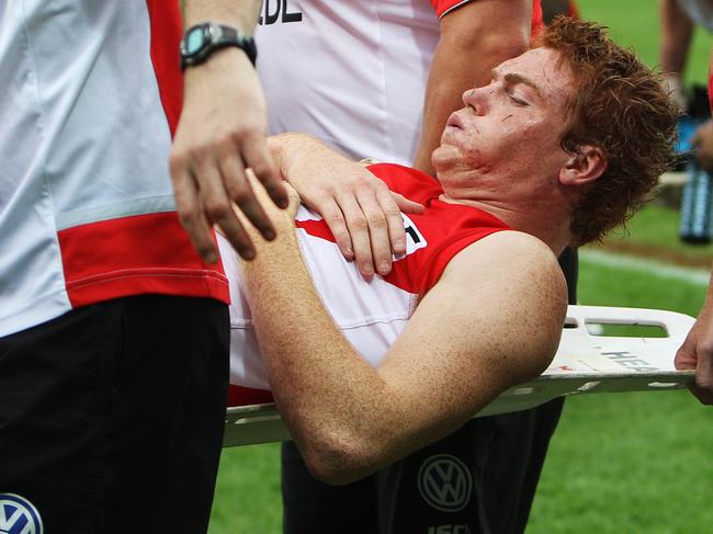 Gary Rohan is stretchered off with a serious ankle injury during the Sydney Swans v North Melbourne Kangaroos AFL game at the SCG in Sydney.