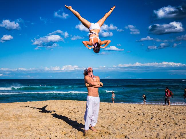 Just doing some acrobats with the beautiful Bondi backdrop. Picture: Jonathan Armstrong