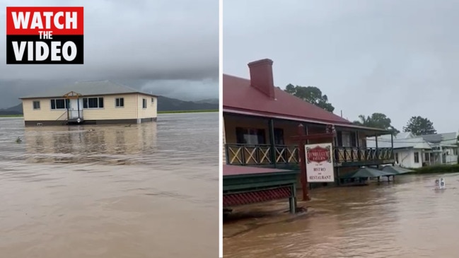 Surf champ Joel Parkinson uses his jetski to get to flood-hit properties