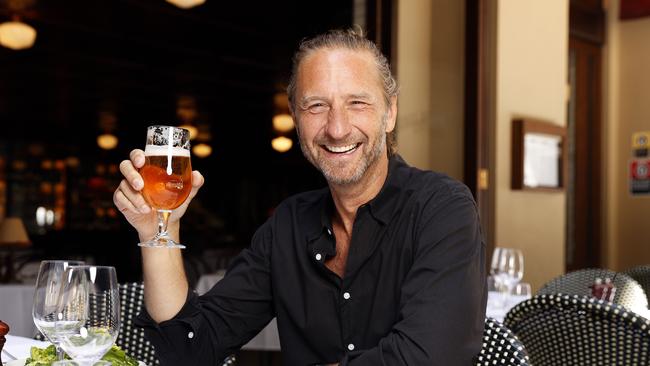 Pictured is Justin Hemmes at Felix Restaurant to celebrate the end of lockdowns. Picture: Tim Hunter.