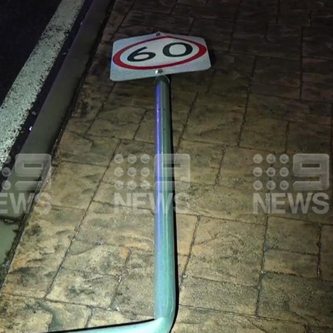 A speed sign damaged in the crash. Picture: 9 News