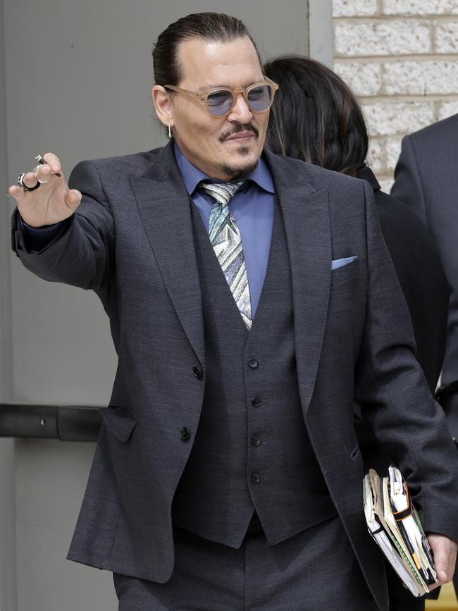 Depp waved at fans outside court during the trial. Picture: Kevin Dietsch/Getty Images/AFP