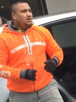 Police are searching for a man seen in an orange jumper in connection to a street brawl in front of Parramatta's Westfield on June 18.