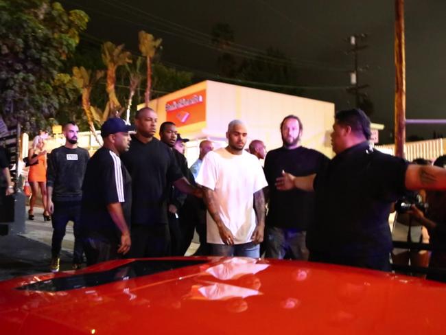 Rapper Chris Brown seen leaving 1OAK after a shooting.
