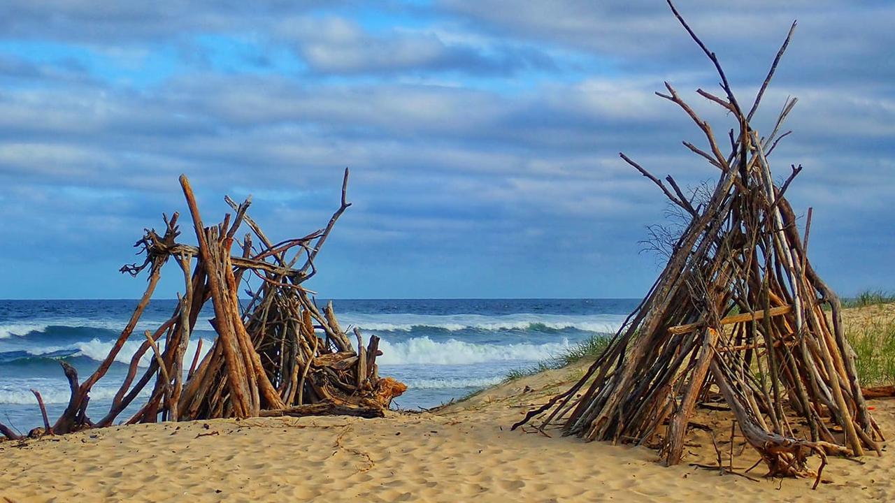 Driftwood huts at Urunga, snapped by Bronwyn Hawkes.