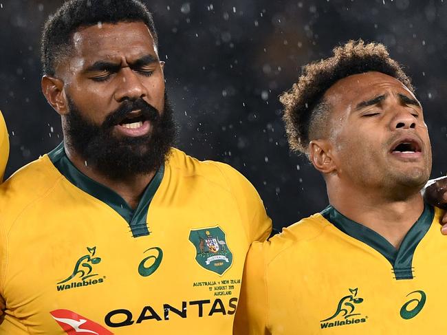 Wallabies players sing the national anthem prior to the Bledisloe Cup match between the New Zealand All Blacks and the Australian Wallabies  at Eden Park in Auckland, New Zealand, Saturday, August 17, 2019. (AAP Image/Dave Hunt) NO ARCHIVING, EDITORIAL USE ONLY