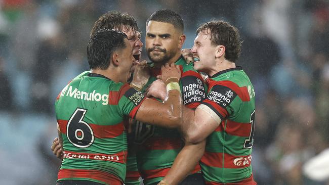 SYDNEY, AUSTRALIA – MAY 09: Latrell Mitchell of the Rabbitohs celebrates with teammates after kicking a two-point field goal during the round 10 NRL match between the South Sydney Rabbitohs and Brisbane Broncos at Accor Stadium on May 09, 2025, in Sydney, Australia. (Photo by Darrian Traynor/Getty Images)