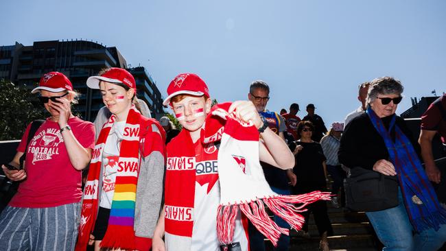 Swans’ fans on their way to the MCG. Picture: NewsWire/Nadir Kinani