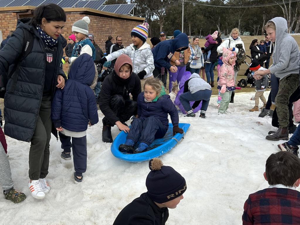 Emmerson having a 'toboggan' good time on the snow fields at Snowflakes in Stanthorpe on Saturday, July 1 2023.