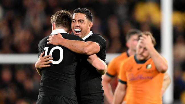 WELLINGTON, NEW ZEALAND - SEPTEMBER 28: Anton Lienert-Brown celebrates with Beauden Barrett of New Zealand during The Rugby Championship & Bledisloe Cup match between New Zealand All Blacks and Australia Wallabies at Sky Stadium on September 28, 2024 in Wellington, New Zealand. (Photo by Hannah Peters/Getty Images)