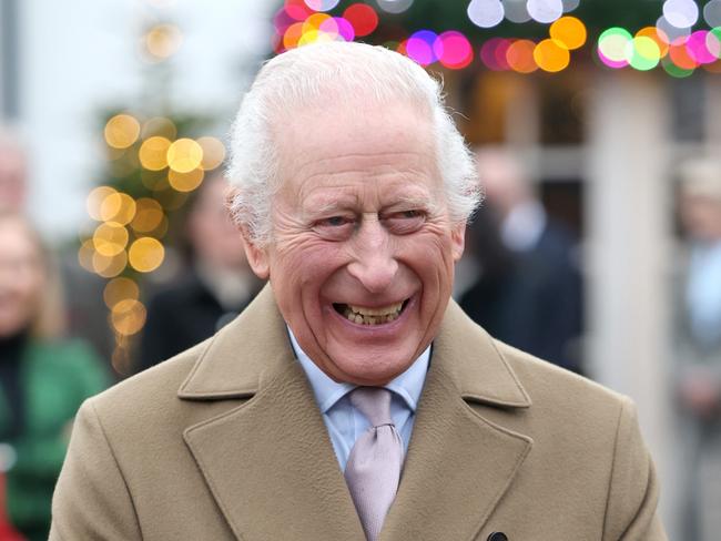 TETBURY, ENGLAND - DECEMBER 13: King Charles III smiles as he arrives for the The King's Foundation's annual 'Crafts at Christmas' at Highgrove Gardens on December 13, 2024 in Tetbury, England. The King's Foundation is a charitable organisation established by His Majesty when he was Prince of Wales, in 1990. Guided by His Majesty's vision and values, the foundation's mission is to foster and strengthen communities where people, places, and the planet can thrive together in harmony. King Charles III continues to serve as the foundation's Royal Founding President. (Photo by Chris Jackson - Pool/Getty Images)