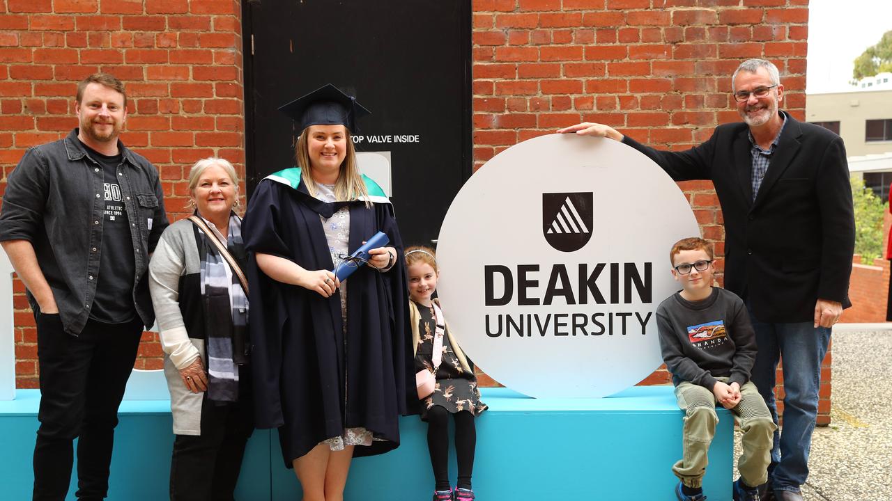 Deakin graduate Taya Kenna with with husband Pete, parents Sandy and Tony and children Sophie,7, and Cooper, 9. Picture: Alison Wynd