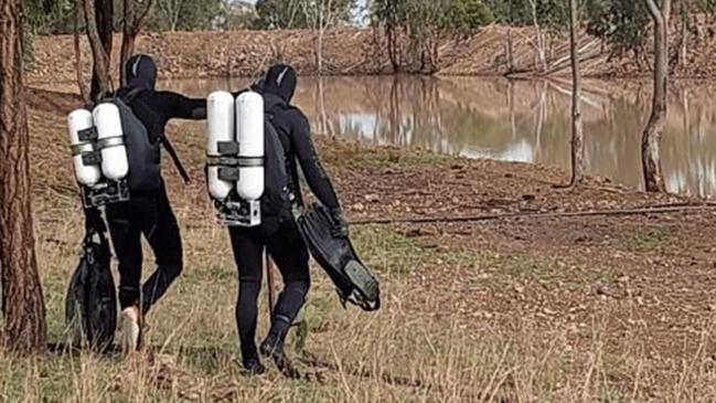 Police released images of divers searching a body of water as they continue their search for Jack McLennan. Picture: QPS