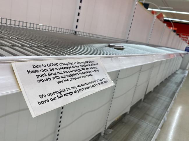 BRISBANE AUSTRALIA - NewsWire Photos JANUARY 13, 2022: Shelves in the toilet paper section are empty at Coles in the Indooroopilly shopping centre. Supply chains are under pressure as the Omicron variant spreads throughout Queensland.  NewsWire / Sarah Marshall