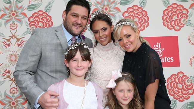 Brendan and Alex Fevola with daughters Leni, Mia and Lulu. Picture: Julie Kiriacoudis