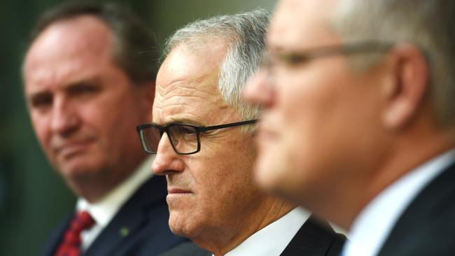 Malcolm Turnbull (centre) has Barnaby Joyce to thank for his 2016 federal election victory. Picture: AAP / File