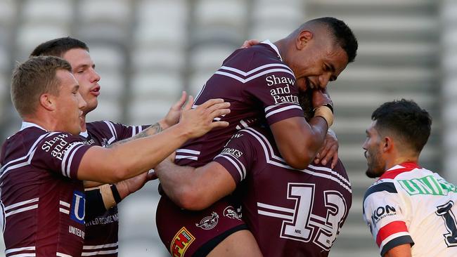 GOSFORD, AUSTRALIA - MARCH 02: Jake Trbojevic of the Manly Sea Eagles celebrates his try with team mates during the NRL Trial match between the Manly Sea Eagles and the Sydney Roosters at Central Coast Stadium on March 02, 2019 in Gosford, Australia. (Photo by Ashley Feder/Getty Images)