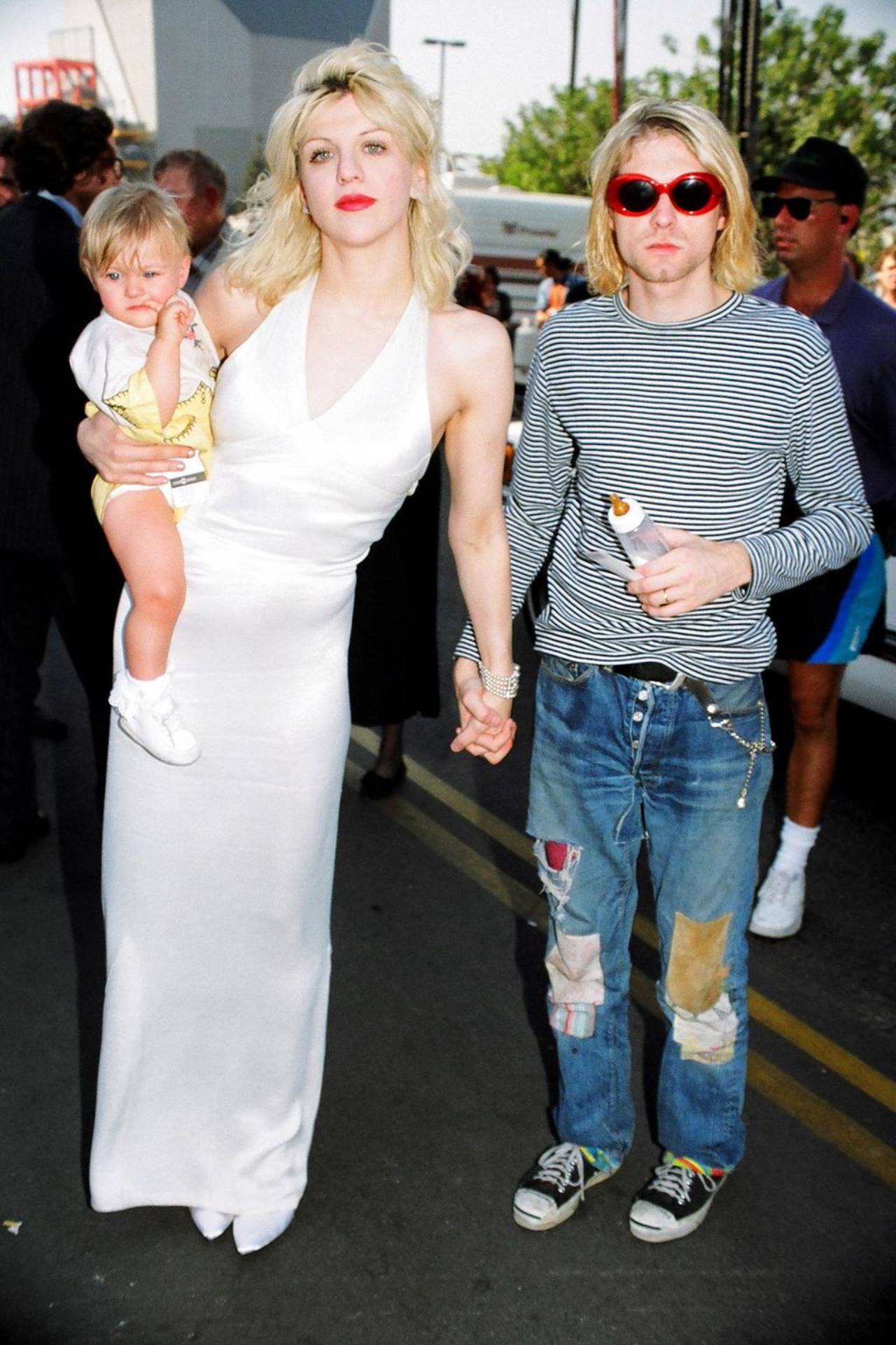 <h2>1993 – Courtney Love</h2><p>Any parent will tell you that sometimes, leaving your child with a carer just isn’t an option. In a move likely made of necessity, Courtney Love walked the red carpet at the 1993 MTV VMAs with her young daughter, Frances Bean Cobain, to support husband and alt-rock king Kurt Cobain. This kind of rock-and-roll approach to glamour would come to define Love’s style.</p>