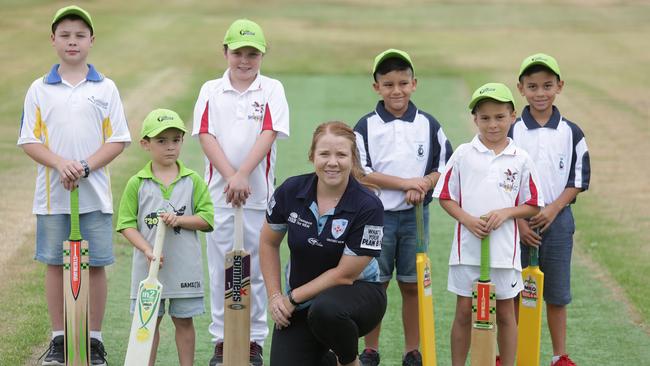 Samantha Devlin from Cricket NSW with local kids getting ready for the new T20 Blast. Photo: Tim Clapin