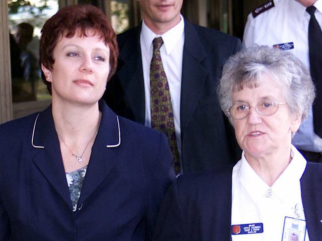 Kathleen Folbigg leaves Supreme Court at Darlinghurst in Sydney in 2003, with the assistance of the Salvation Army. Picture: Stephen Cooper