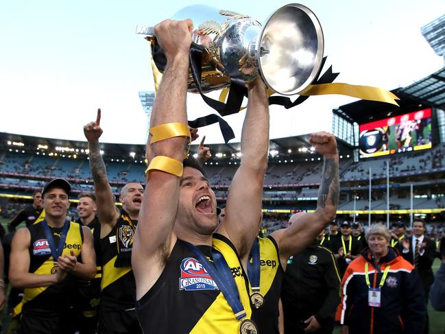 Richmond's Trent Cotchin leaves the field with the Premiership Cup after the Tigers defeated the GWS Giants in the 2019 AFL Grand Final at the MCG. picture. Phil Hillyard