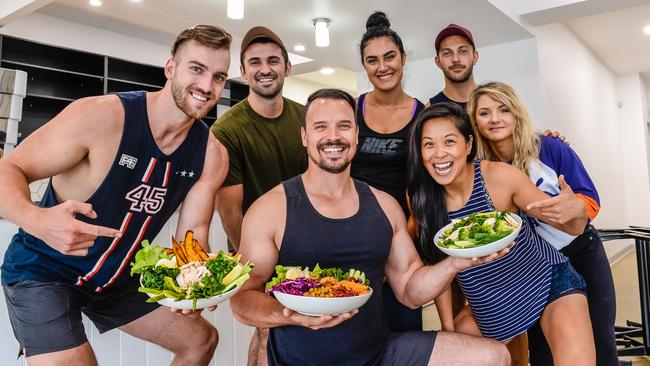 New Muscle Bar Cafe at North Adelaide. Bodie Milsom. in the new cafe with some food and his team. 12th January 2018 AAP/ROY VANDERVEGT