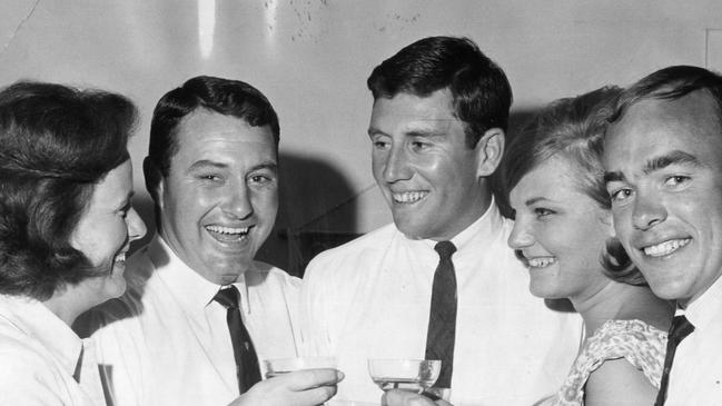 Drinking a toast to cricketer Ian Chappell to celebrate his inclusion in the Australian Test team (from left) Gaynor Jarman, her husband Barry Jarman, Ian Chappell, his fiancee Kay Ingerson and SA team-mate Lynn Marks. Photo: 1966.