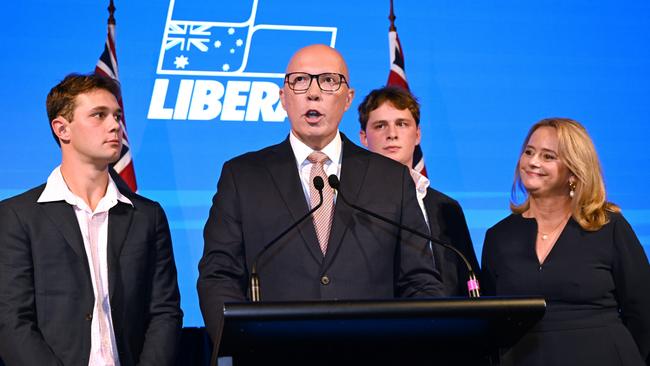 Opposition Leader Peter Dutton concedes defeat alongside wife Kirilly and their children Harry and Tom on election night. Picture: Getty Images