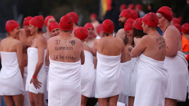 Swimmers wait to hit the Derwent. Picture: SAM ROSEWARNE