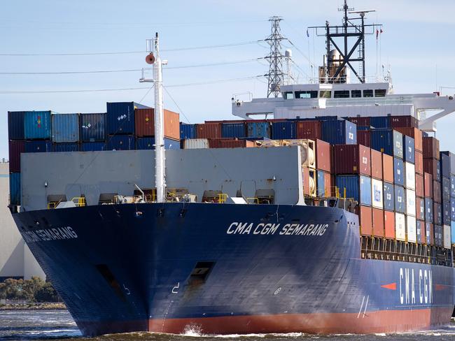 MELBOURNE, DECEMBER 9, 2022: Tour of AustraliaÃs largest container and general cargo port, the Port of Melbourne. A container ship passes under the West Gate Bridge. Picture: Mark Stewart
