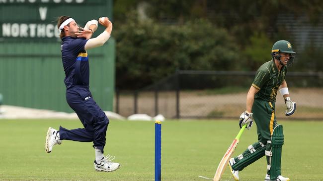 Ringwood bowler Zac Evans in action on Saturday. Picture: Stuart Milligan