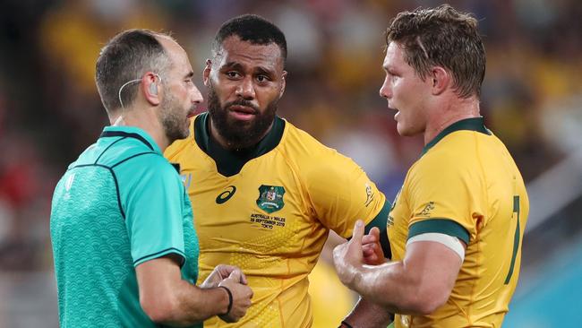 Referee Romain Poite spoke with Samu Kerevi after an infringement against Wales. Picture: Dan Mullan