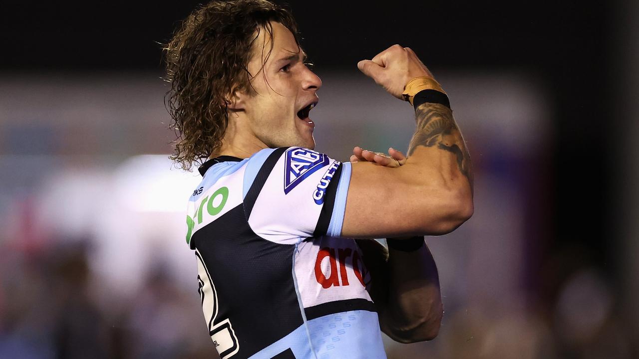 SYDNEY, AUSTRALIA - AUGUST 31: Nicho Hynes of the Sharks celebrates a try that was then disallowed during the round 26 NRL match between Cronulla Sharks and New Zealand Warriors at PointsBet Stadium, on August 31, 2024, in Sydney, Australia. (Photo by Cameron Spencer/Getty Images)