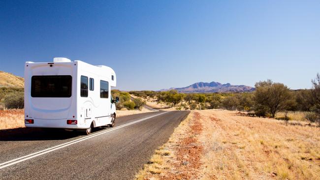 The man’s body was found in a campervan at a rest stop on the New England Highway.