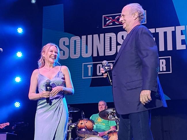 Aussie pop princess Kylie Minogue made a special guest appearance with promoter Michael Gudinski to introduce James Reyne. Picture: Mushroom Group