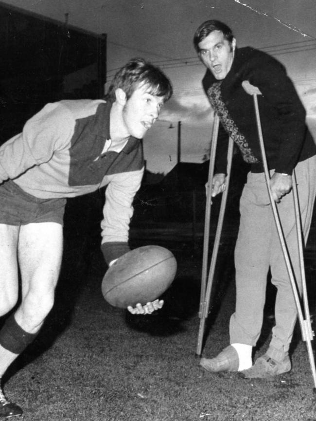 Noel Teasdale on crutches barks instructions at Woodville training in 1970