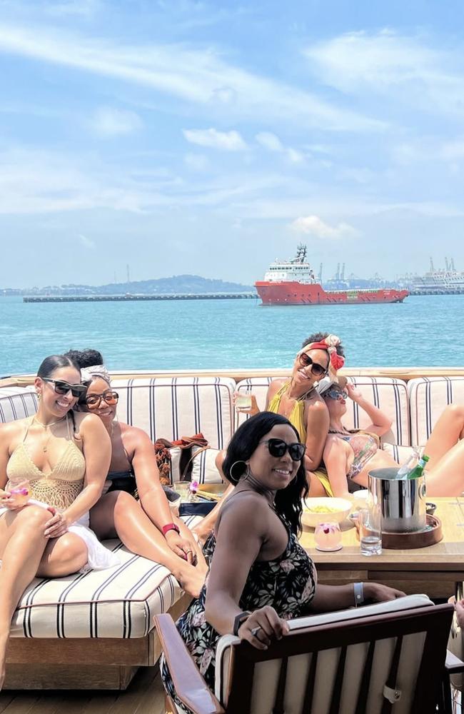 Taylor Swift, reclining at right, with backup singers. Picture: Instagram: Jeslyn Gorman