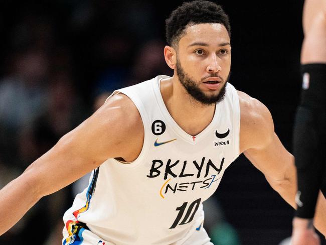 CHARLOTTE, NORTH CAROLINA - DECEMBER 31: Ben Simmons #10 of the Brooklyn Nets guards LaMelo Ball #1 of the Charlotte Hornets in the second quarter during their game at Spectrum Center on December 31, 2022 in Charlotte, North Carolina. NOTE TO USER: User expressly acknowledges and agrees that, by downloading and or using this photograph, User is consenting to the terms and conditions of the Getty Images License Agreement.   Jacob Kupferman/Getty Images/AFP (Photo by Jacob Kupferman / GETTY IMAGES NORTH AMERICA / Getty Images via AFP)