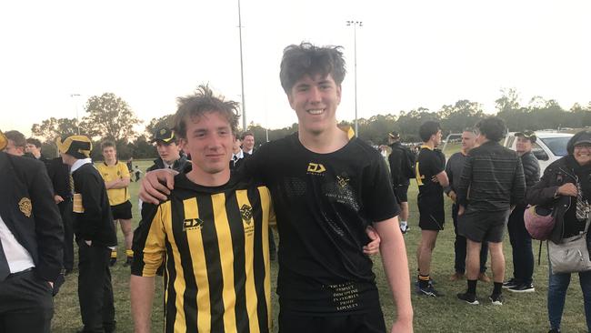 The St Laurence's College community has had many reasons to smile - with two sporting premierships. Pictured are the First XV and First XI captains who are best mates - Joe Taylor and Jake Kurbatoff.