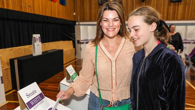 Greens Senator Sarah Hanson-Young voting with her daughter Kora last month. Picture: AAP Image/Russell Millard