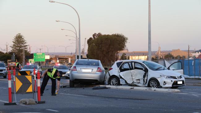 Police at the scene of the crash on the corner of Semaphore Rd and Fletcher Rd at Birkenhead. Picture: Dean Martin